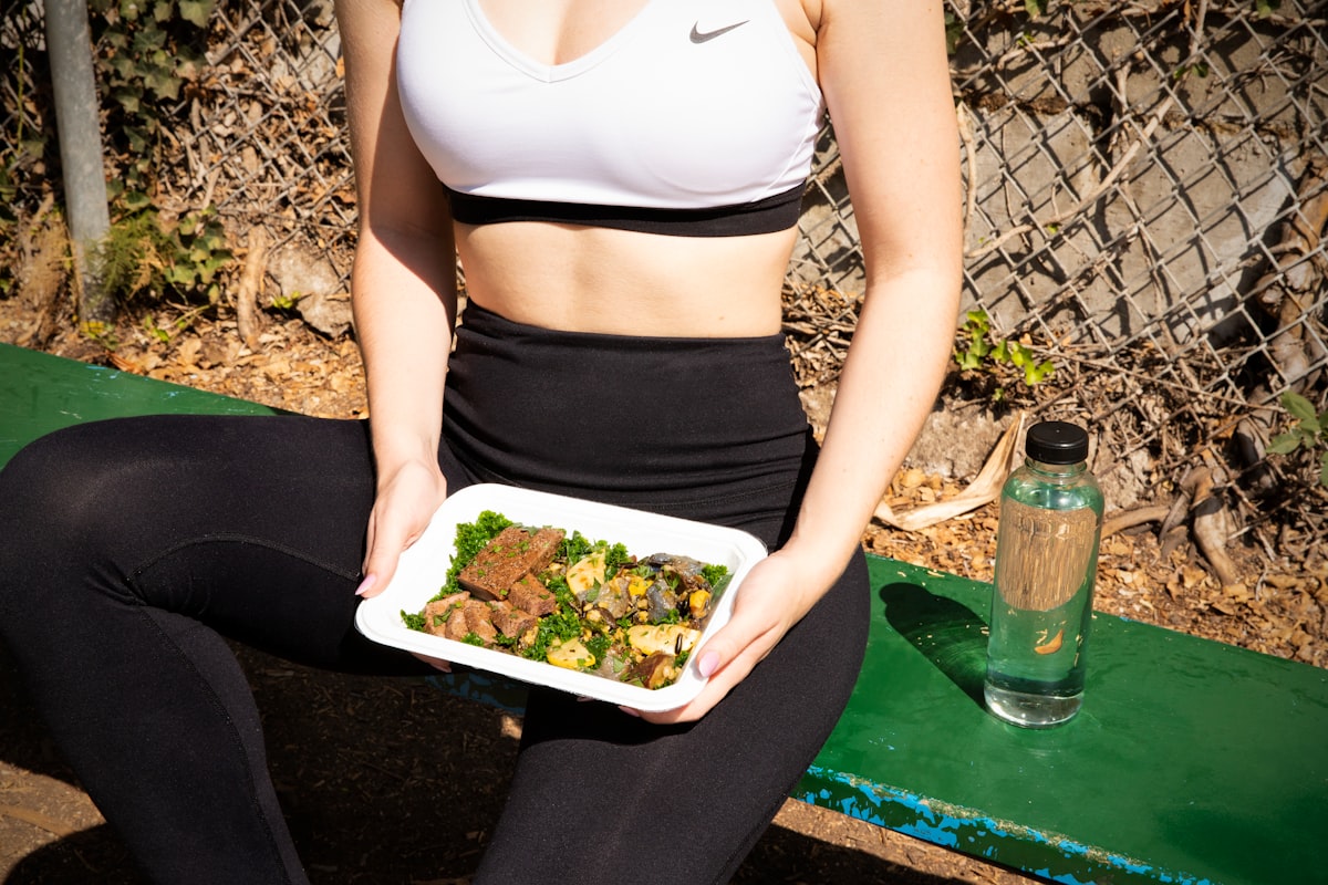 Client preparing meals according to nutrition plan